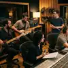 musicos en estudio de grabacion